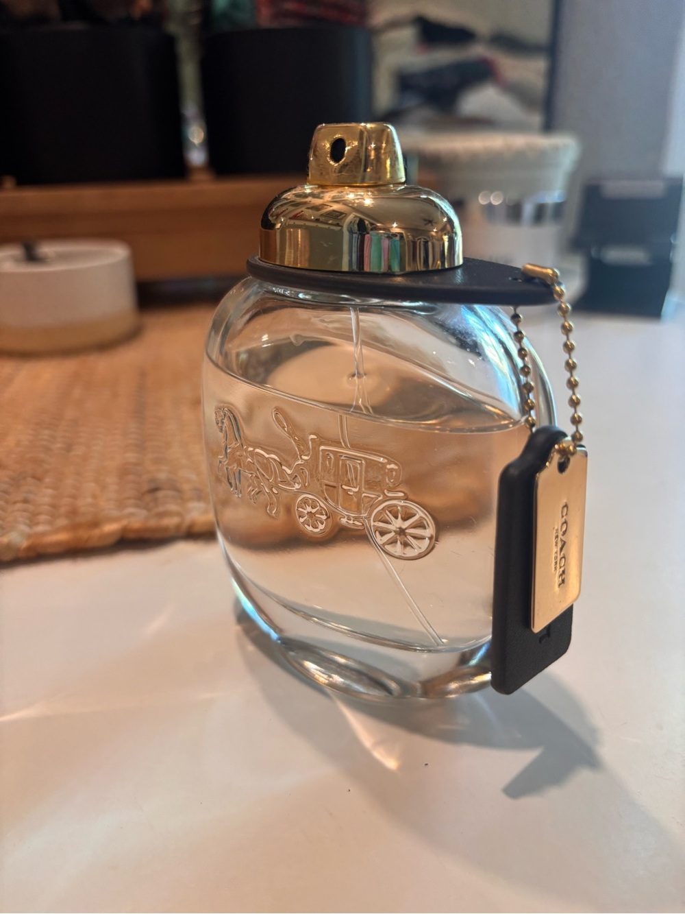 Coach Clear Glass Perfume Bottle with Gold Cap and Black Tag